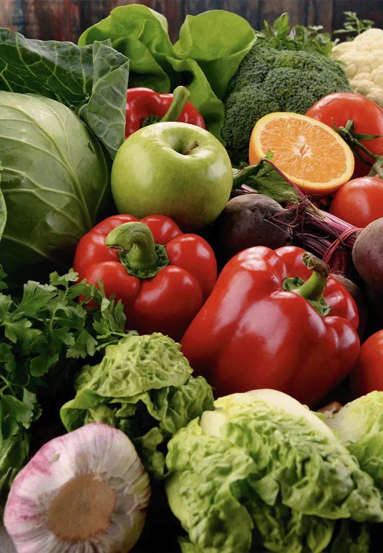 Zoomed in photo of various fruits and vegetables distributed by oke produce